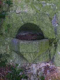 Close-up of the holy water font in Dunaman Church