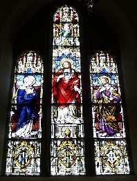 Stained Glass Windows behind the altar in Ballysteen Church