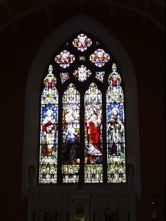 Stained Glass Windows behind the altar in Bruff Church
