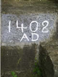 Stone at the entrance to Kilcornan graveyard