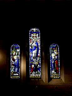 Stained glass windows behind altar in St Mary's church