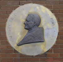Plaques on the wall of Dooradoyle Oratory